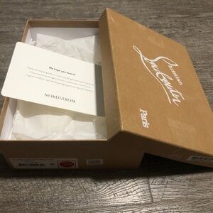 Cristian louboutin empty shoes box with tips.  Northdrom store